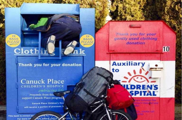 Woman who died trapped in donation bin